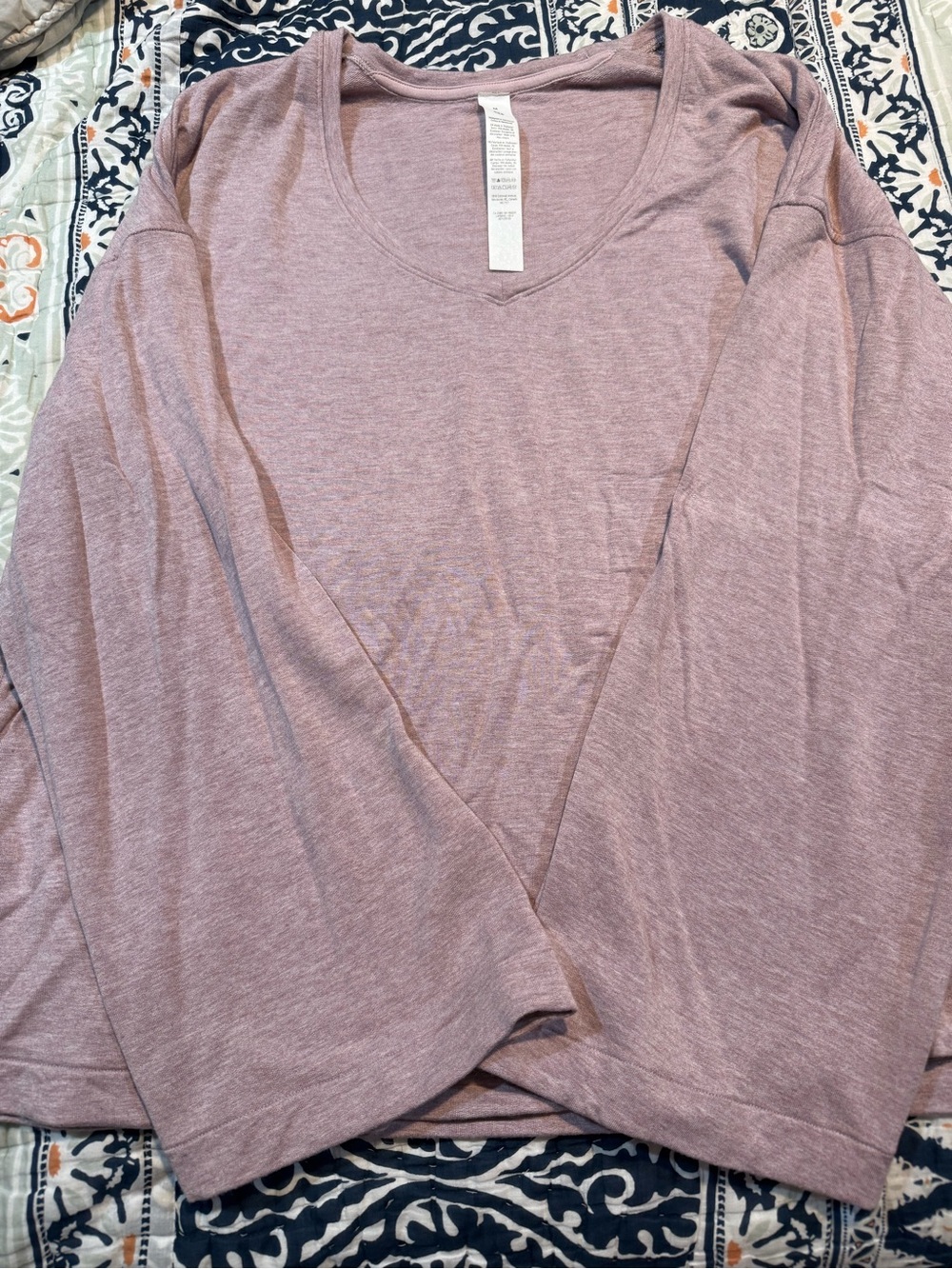 Lululemon Be Calm V neck Bell Sleeve shirt.  Heathered porcelain pink.  Size med